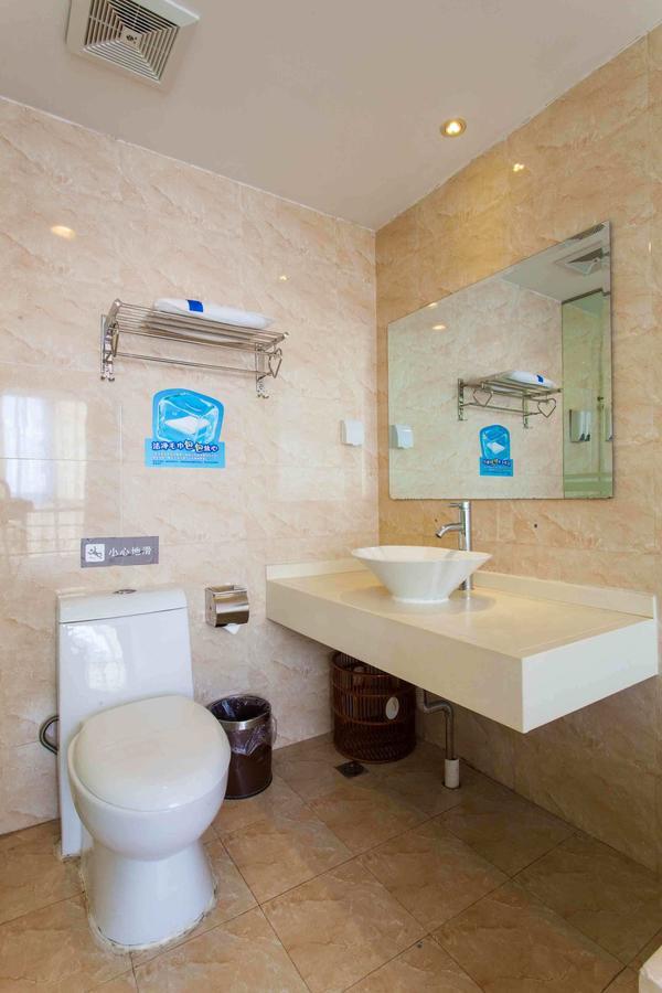 7 Days Inn Yangjiang Xinyue International Studio Quarto foto